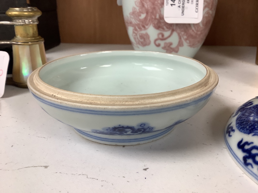 A Chinese underglaze copper red vase and a Chinese blue and white ‘dragon’ box and cover, tallest 15cm